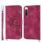 Skin-feel Flowers Embossed Wallet Leather Phone Case