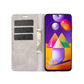 For Samsung Galaxy M31s Retro-skin Business Magnetic Suction Leather Case with Holder & Card Slots & Wallet