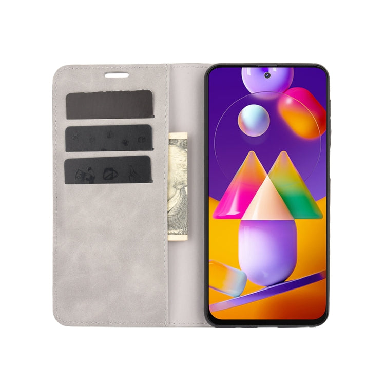 For Samsung Galaxy M31s Retro-skin Business Magnetic Suction Leather Case with Holder & Card Slots & Wallet