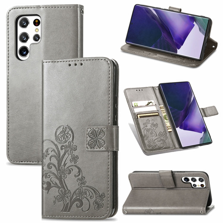 Four-leaf Clasp Embossed Leather Phone Case with Lanyard & Card Slot & Wallet & Bracket Function