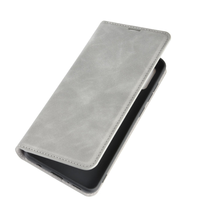 For Galaxy A21s Retro-skin Business Magnetic Suction Leather Case with Holder & Card Slots & Wallet